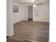 Bright living room features durable wood flooring and a modern ceiling fan at 3785 Somerset Sw Dr, Marietta, GA 30064