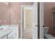 Bright bathroom featuring a white vanity, with a separate toilet and shower area at 423 Morgan Falls Chase, Canton, GA 30114