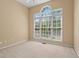 Bedroom with a high ceiling and a wall of windows letting in tons of natural light at 423 Morgan Falls Chase, Canton, GA 30114