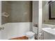 Charming half bathroom with elegant wood floors and decorative accents at 423 Morgan Falls Chase, Canton, GA 30114