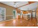 Charming kitchen with stainless steel appliances, center island, and hardwood floors at 423 Morgan Falls Chase, Canton, GA 30114