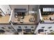 Aerial view showcases rooftop decks with outdoor kitchens, seating, and dining areas at 4812 Moonview Ln # 4, Sugar Hill, GA 30518