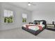 Modern bedroom with two large windows at 4812 Moonview Ln # 4, Sugar Hill, GA 30518