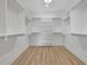 Spacious walk-in closet with shelving at 4812 Moonview Ln # 4, Sugar Hill, GA 30518