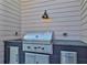 Outdoor kitchen features a grill, countertop, and stainless steel storage at 4812 Moonview Ln # 4, Sugar Hill, GA 30518