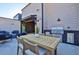 Cozy outdoor patio features a built-in outdoor grill and kitchen, plus a dining and lounging space at 4812 Moonview Ln # 4, Sugar Hill, GA 30518