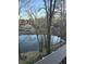 Scenic view of pond with fountain, as seen from balcony at 506 Park Ridge Cir, Marietta, GA 30068