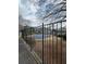 Community pool behind black iron fence at 506 Park Ridge Cir, Marietta, GA 30068