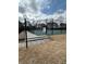 View of the community's tennis court behind a fence at 506 Park Ridge Cir, Marietta, GA 30068