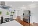 Modern kitchen with stainless steel appliances, quartz countertops, and hardwood floors at 733 Pegg Sw Rd, Atlanta, GA 30315