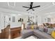 Bright and airy living room with modern lighting, hardwood floors, and stylish furnishings at 733 Pegg Sw Rd, Atlanta, GA 30315