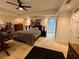 Bedroom with a desk, closet and queen bed at 1049 Panola Rd, Ellenwood, GA 30294