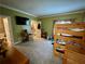 A bedroom has a bunk bed and an attached bathroom at 1049 Panola Rd, Ellenwood, GA 30294