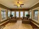 A bright living room has lots of natural light and features hardwood floors and two plush chairs at 1049 Panola Rd, Ellenwood, GA 30294