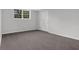 Unfinished basement with carpet and window at 1531 Piedmont Ne Rd, Marietta, GA 30066