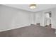 Finished basement with neutral carpet, paint, and lighting at 1531 Piedmont Ne Rd, Marietta, GA 30066
