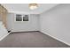 Unfinished basement with carpet and window at 1531 Piedmont Ne Rd, Marietta, GA 30066