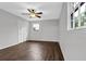 Bedroom features hardwood floors, neutral paint, and bright natural light at 1531 Piedmont Ne Rd, Marietta, GA 30066