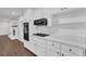 Well-equipped kitchen with gas cooktop, built-in oven, and marble countertops at 1531 Piedmont Ne Rd, Marietta, GA 30066