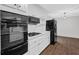 Modern kitchen showcasing stainless steel appliances, gas range, and white cabinetry at 1531 Piedmont Ne Rd, Marietta, GA 30066