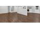 Open-concept living area with hardwood floors, fireplace and freshly painted walls at 1531 Piedmont Ne Rd, Marietta, GA 30066