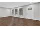 Bright living room featuring hardwood floors, fresh paint, and plenty of natural light at 1531 Piedmont Ne Rd, Marietta, GA 30066