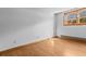 Bedroom with hardwood floors and a window that lets in sunlight at 2003 Graystone Pkwy, Grayson, GA 30017