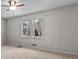 Neutral bedroom featuring carpeted floors, baseboard heat and natural light at 2003 Graystone Pkwy, Grayson, GA 30017