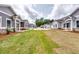 Serene community street view with manicured lawns, showcasing the neighborhood's charm and appeal at 3855 Shelleydale Dr, Powder Springs, GA 30127