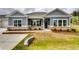 Charming single-Gathering home with a well-manicured lawn and attractive brick accents at 3855 Shelleydale Dr, Powder Springs, GA 30127