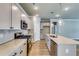 Well-equipped kitchen with stainless steel appliances, granite countertops, and ample cabinet space at 3855 Shelleydale Dr, Powder Springs, GA 30127