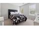 Comfortable bedroom with natural light and a neutral color scheme at 4147 Pinehurst Valley Dr, Decatur, GA 30034