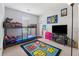 Fun bedroom featuring a bunk bed, television, and playful decor at 4147 Pinehurst Valley Dr, Decatur, GA 30034