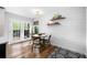 Eat in kitchen with breakfast nook, and glass paneled doors leading to the back deck at 8885 N Mount Dr, Johns Creek, GA 30022