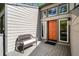 Inviting front porch with a bench provides a warm welcome to this lovely home at 8885 N Mount Dr, Johns Creek, GA 30022