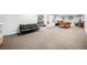 Basement game room with a pool table, couch and carpeted flooring at 8885 N Mount Dr, Johns Creek, GA 30022