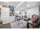 Bright studio with white cabinetry, painting easels, and art supplies at 8885 N Mount Dr, Johns Creek, GA 30022