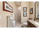 Beautiful bathroom features granite countertops, a tiled walk-in shower, and framed art at 115 Batten Board Way Way, Woodstock, GA 30189