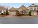 Charming home with a well-manicured front yard and a two-car garage at 115 Batten Board Way Way, Woodstock, GA 30189