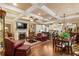 Comfortable living room flows into a bright kitchen and dining area at 115 Batten Board Way Way, Woodstock, GA 30189