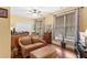 Comfortable office with a sitting area, hardwood floors, and plenty of natural light at 115 Batten Board Way Way, Woodstock, GA 30189