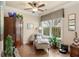 Comfortable sitting room with hardwood floors, a chaise lounge, and plenty of natural light at 115 Batten Board Way Way, Woodstock, GA 30189