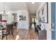 Welcoming entryway with hardwood floors, elegant lighting, and stylish decor at 2021 Adam Acres Dr, Lawrenceville, GA 30043