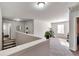 Upstairs hallway with access to other rooms, and filled with natural light at 2021 Adam Acres Dr, Lawrenceville, GA 30043