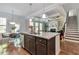 Bright kitchen boasts granite counters, stainless appliances, and an open layout at 2021 Adam Acres Dr, Lawrenceville, GA 30043