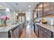 Spacious kitchen with a center island, stainless steel appliances, and ample cabinet space at 2021 Adam Acres Dr, Lawrenceville, GA 30043