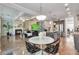 Open-concept living room features a fireplace, ample seating, and hardwood floors at 2021 Adam Acres Dr, Lawrenceville, GA 30043