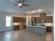 Modern kitchen with stainless steel appliances, kitchen island and hardwood floors at 250 Mooney Rd, Woodstock, GA 30188