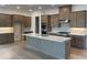 New kitchen featuring an island, stainless appliances, ample cabinet space, and granite countertops at 250 Mooney Rd, Woodstock, GA 30188