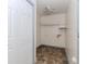 Well lit laundry room with tile floors, ceiling fan, and electrical outlets at 85 Emily Trce, Covington, GA 30016